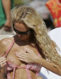 A slim girl posing on the Tenerife Image 5